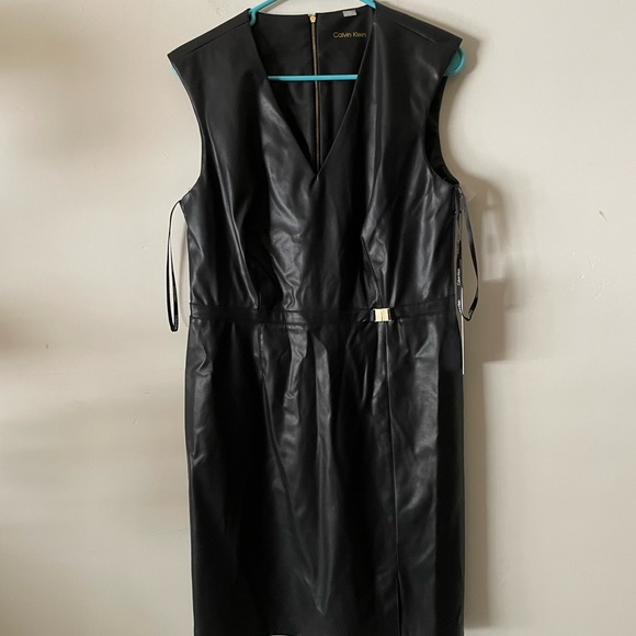 Calvin Klein leather shirt sleeve dress. Knee length ladies size 10. With  zipper